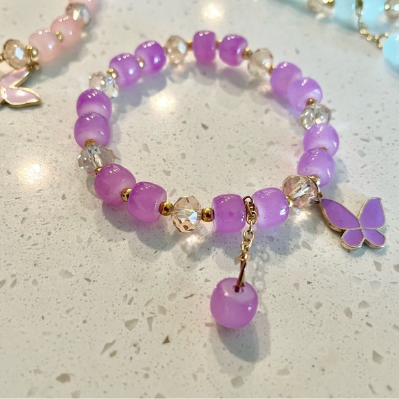 Accessories - Butterfly bracelet with charms.